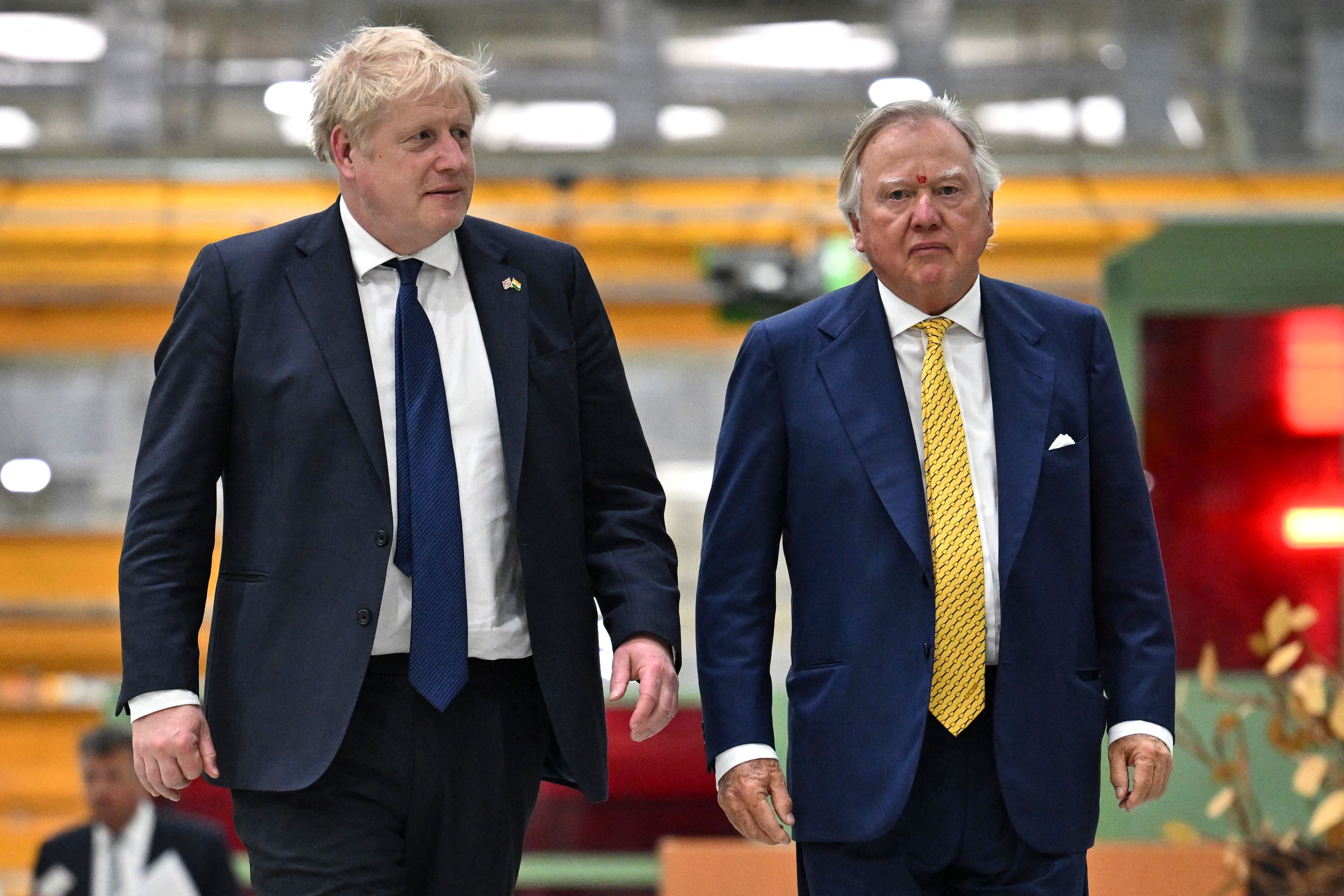 Former PM Boris Johnson and JCB chairman Lord Anthony Bamford