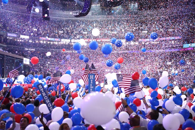 <p>Balloons fall over delegates and attendees at the end of the fourth day of the Democratic National Convention at the Wells Fargo Center, July 28, 2016 in Philadelphia, Pennsylvania</p>