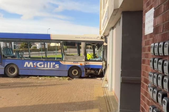 <p>A bus has crashed into a block of flats in Paisley</p>