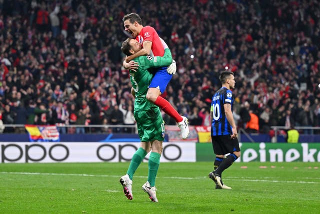 <p>Jan Oblak and Cesar Azpilicueta celebrate after Lautaro Martinez blazed over for Inter </p>