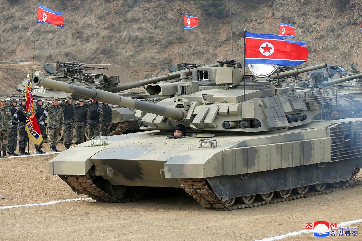 North Korea’s Kim drives new-type tank during drills and calls for efforts to prepare for war