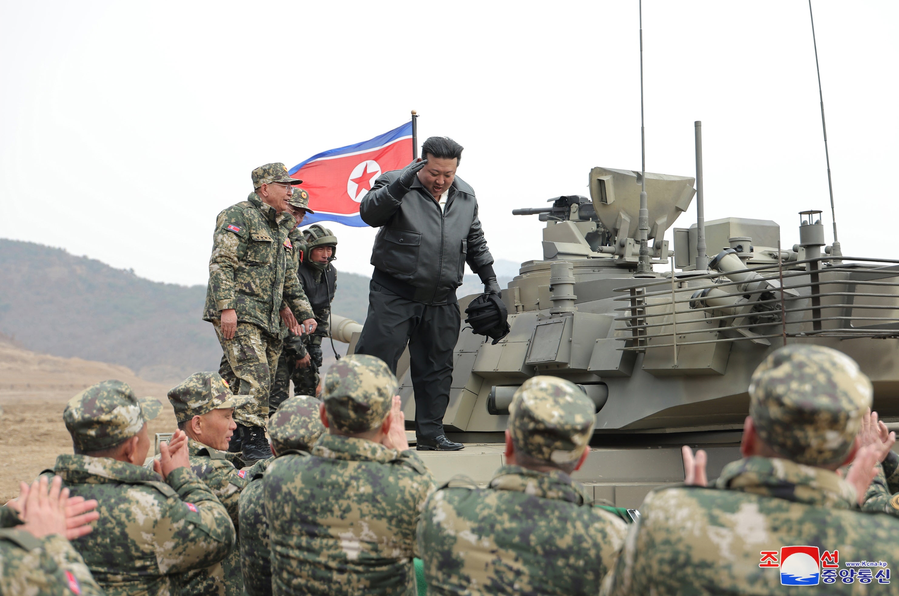 A photo released by the official North Korean Central News Agency (KCNA) North Korean Supreme leader Kim Jong Un reacts during a training competition involving tank units of the Korean People’s Army (KPA), at an undisclosed location in North Korea