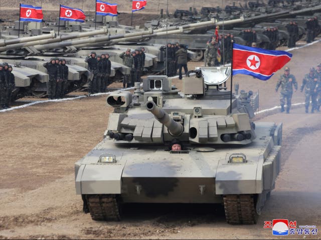 <p>North Korean Supreme leader Kim Jong-un drives new-type tank during drills</p>