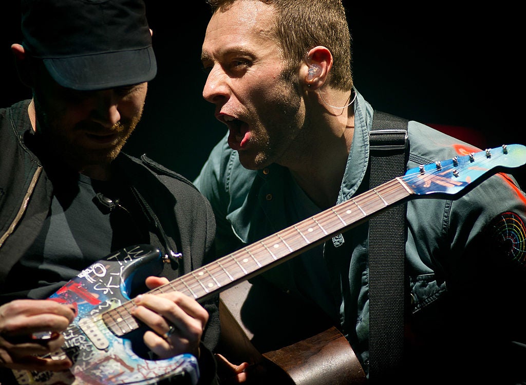 Chris Martin performing on the Pyramid Stage in 2011