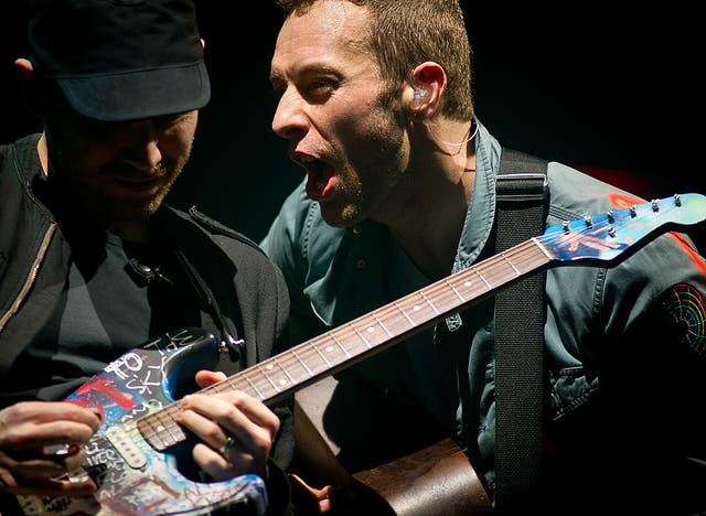 <p>Chris Martin performing on the Pyramid Stage in 2011</p>