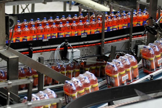 Bottles of Irn Bru in the production hall at AG Barr’s Irn Bru factory in Cumbernauld (Andrew Milligan/PA)