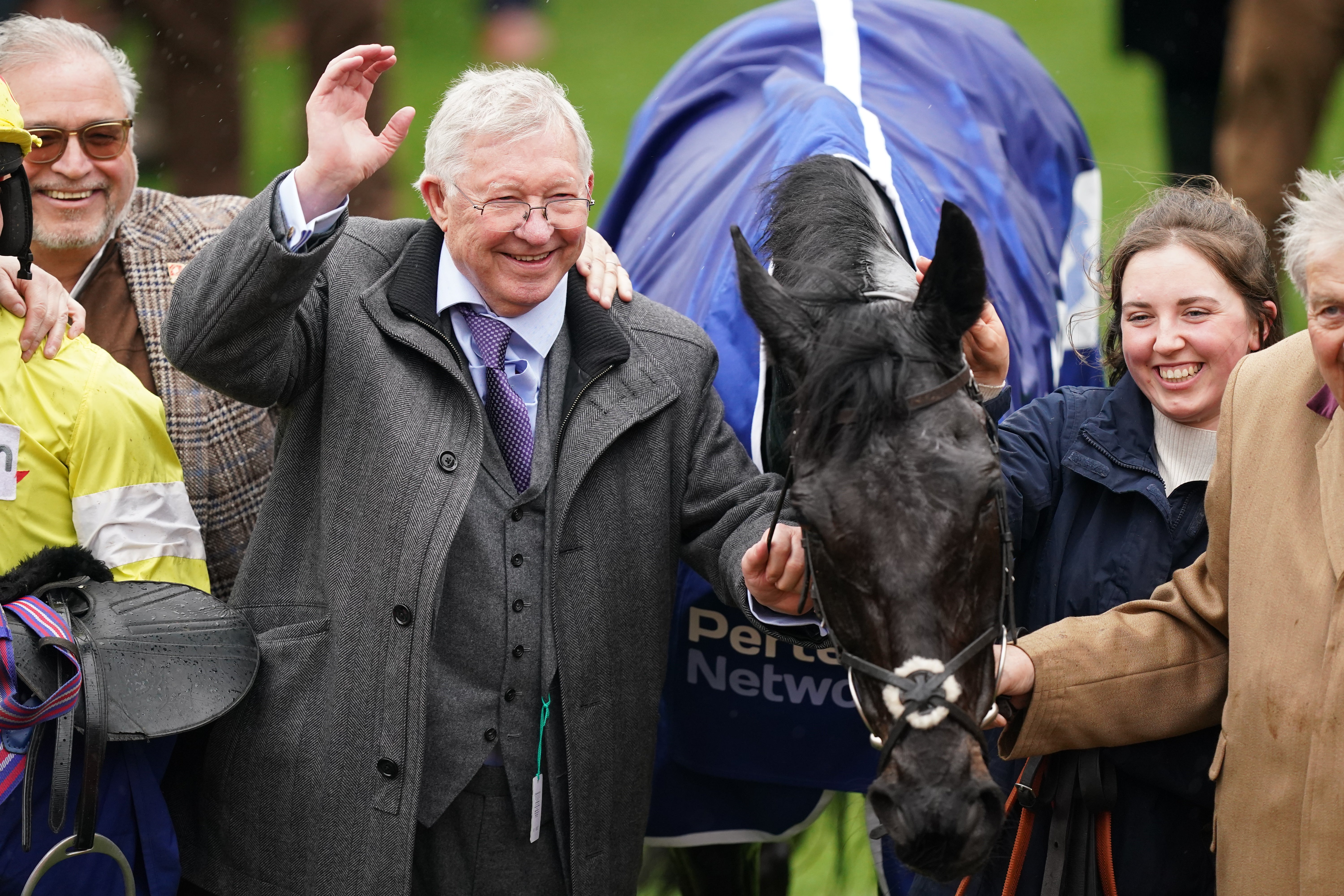 Sir Alex Ferguson celebrates his horse Monmiral winning the Pertemps Network Handicap Hurdle