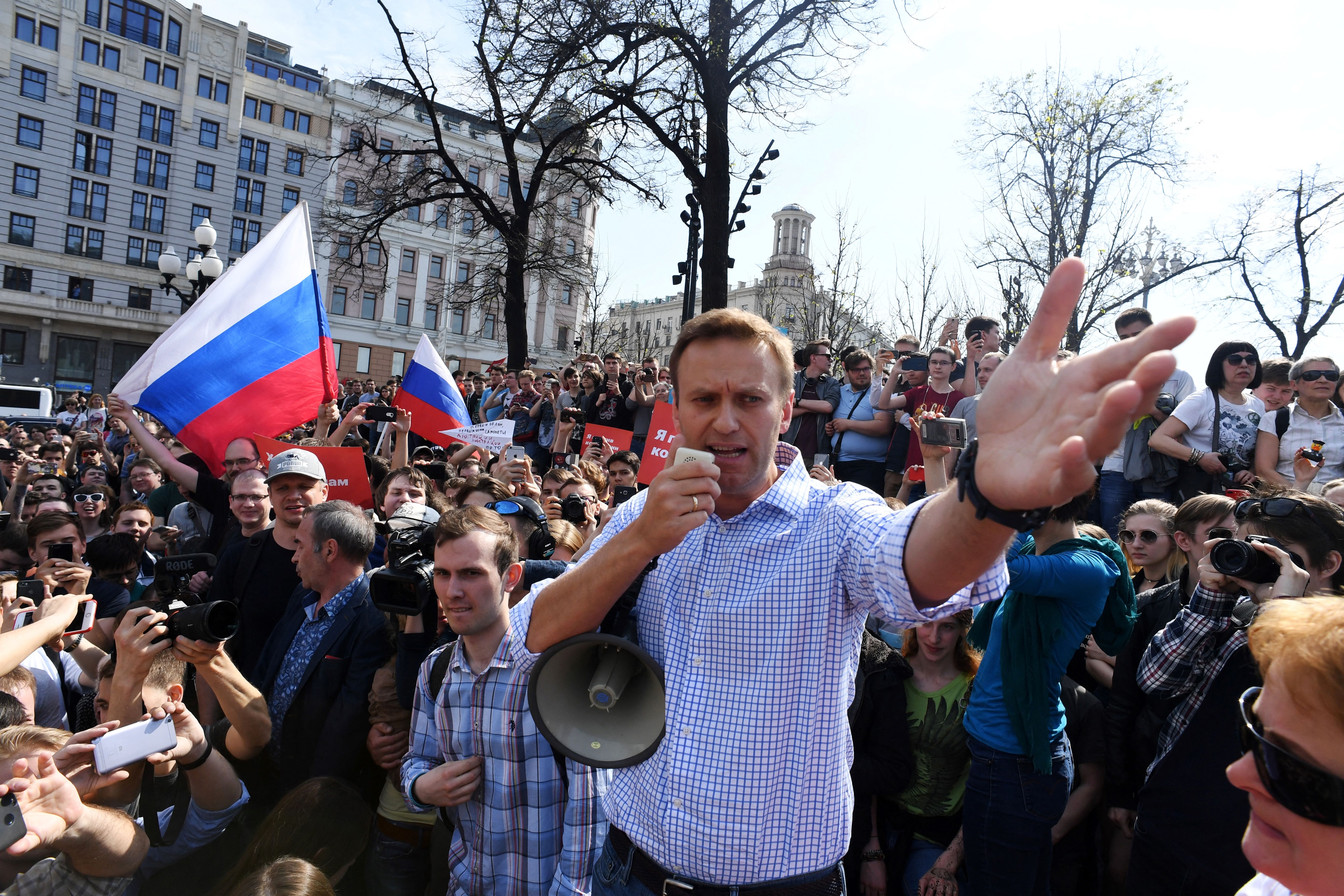 Russian opposition leader Alexei Navalny addresses supporters during an unauthorized anti-Putin rally on May 5, 2018 in Moscow