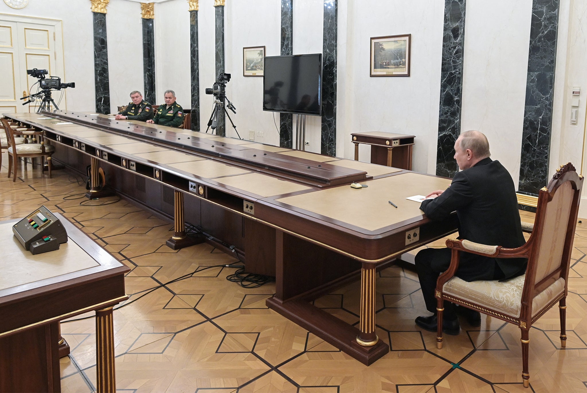 Putin meets with his defence minister Sergei Shoigu and his hief of the general staff Valery Gerasimov in Moscow on 27 February 2022, shortly after Russia invaded Ukraine