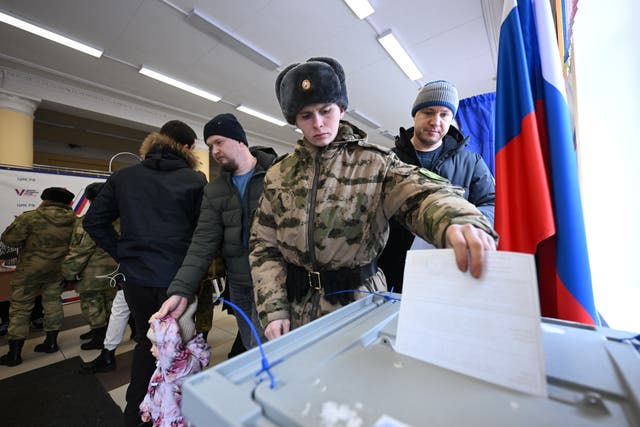 <p>Votes being cast in Moscow. There is no doubt that Vladimir Putin will be declared the winner</p>