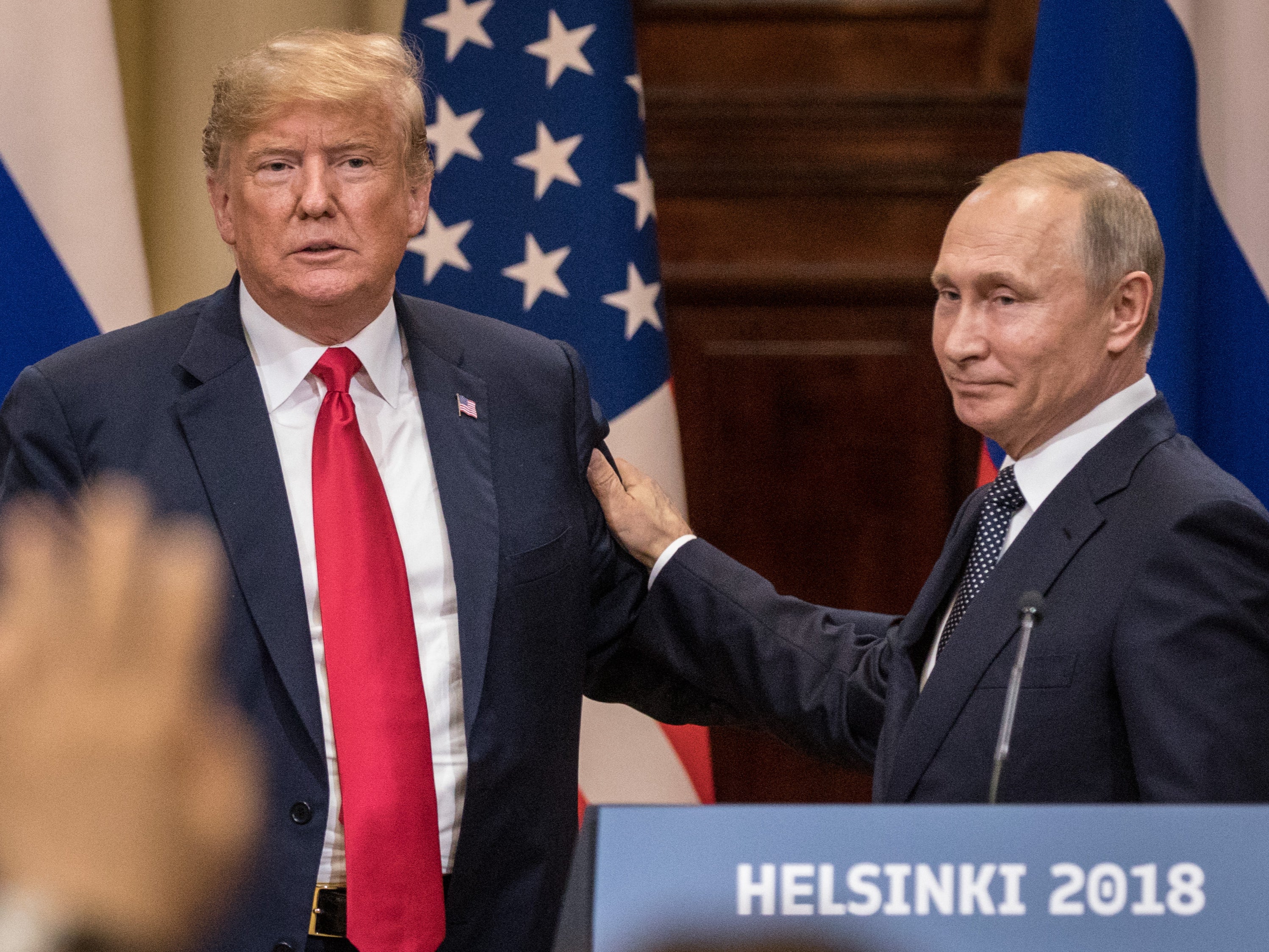 Donald Trump and Russian president Vladimir Putin shake hands at their summit in Helsinki, Finland, on July 16 2018