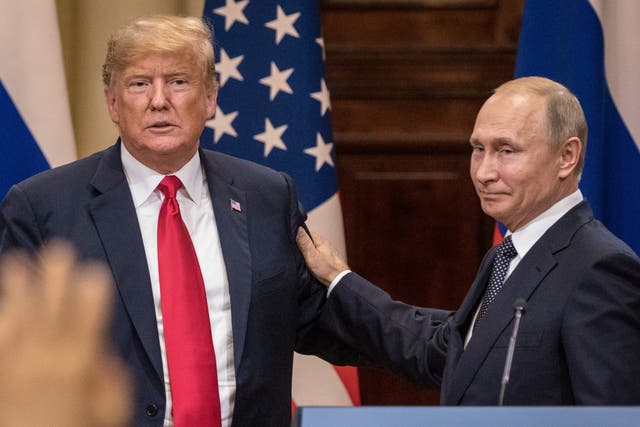 <p>Donald Trump and Russian president Vladimir Putin shake hands at their summit  in Helsinki, Finland, on July 16 2018 </p>