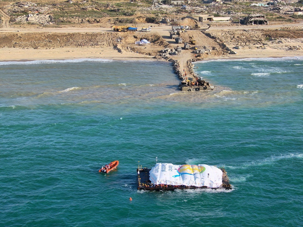 Some food aid from the joint Spanish/US sea mission is docked in Gaza yesterday