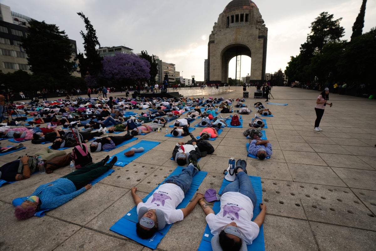 Hundreds of people in Mexico City stretch out for a ‘mass nap’ to commemorate World Sleep Day