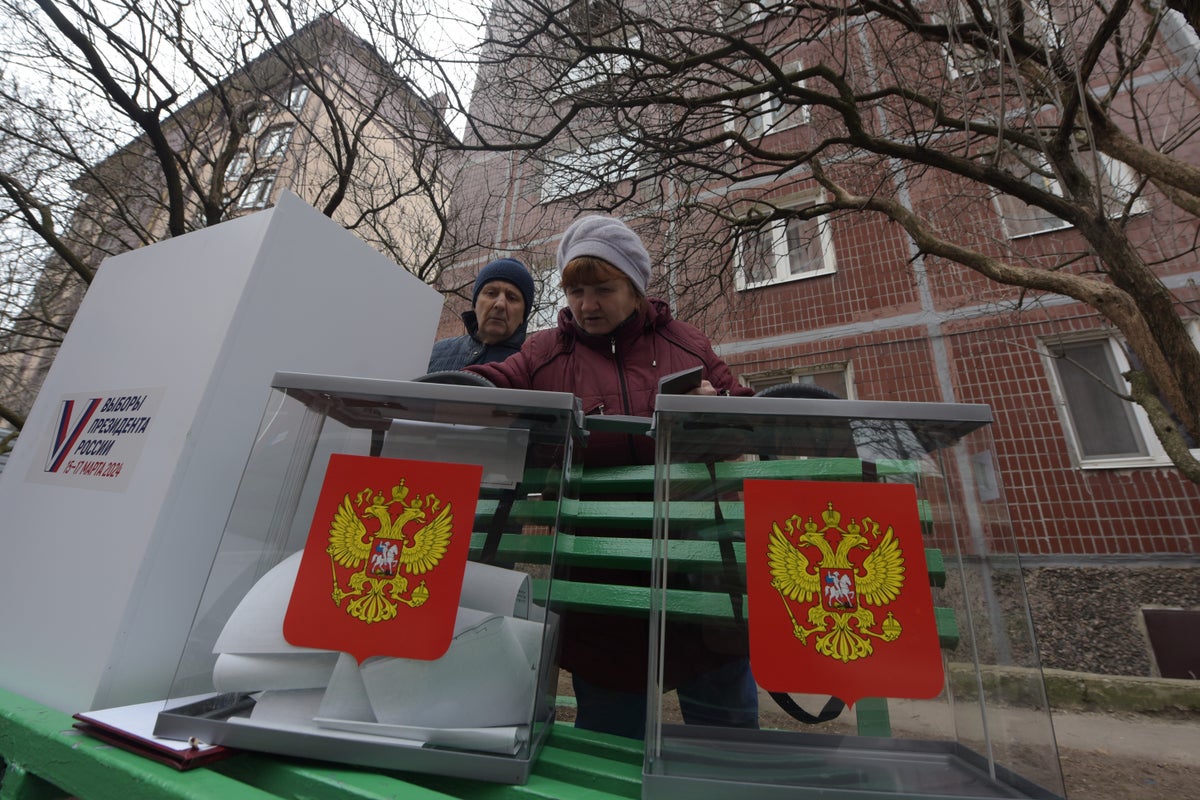 Watch live: Russians head to polls on final voting day of presidential election