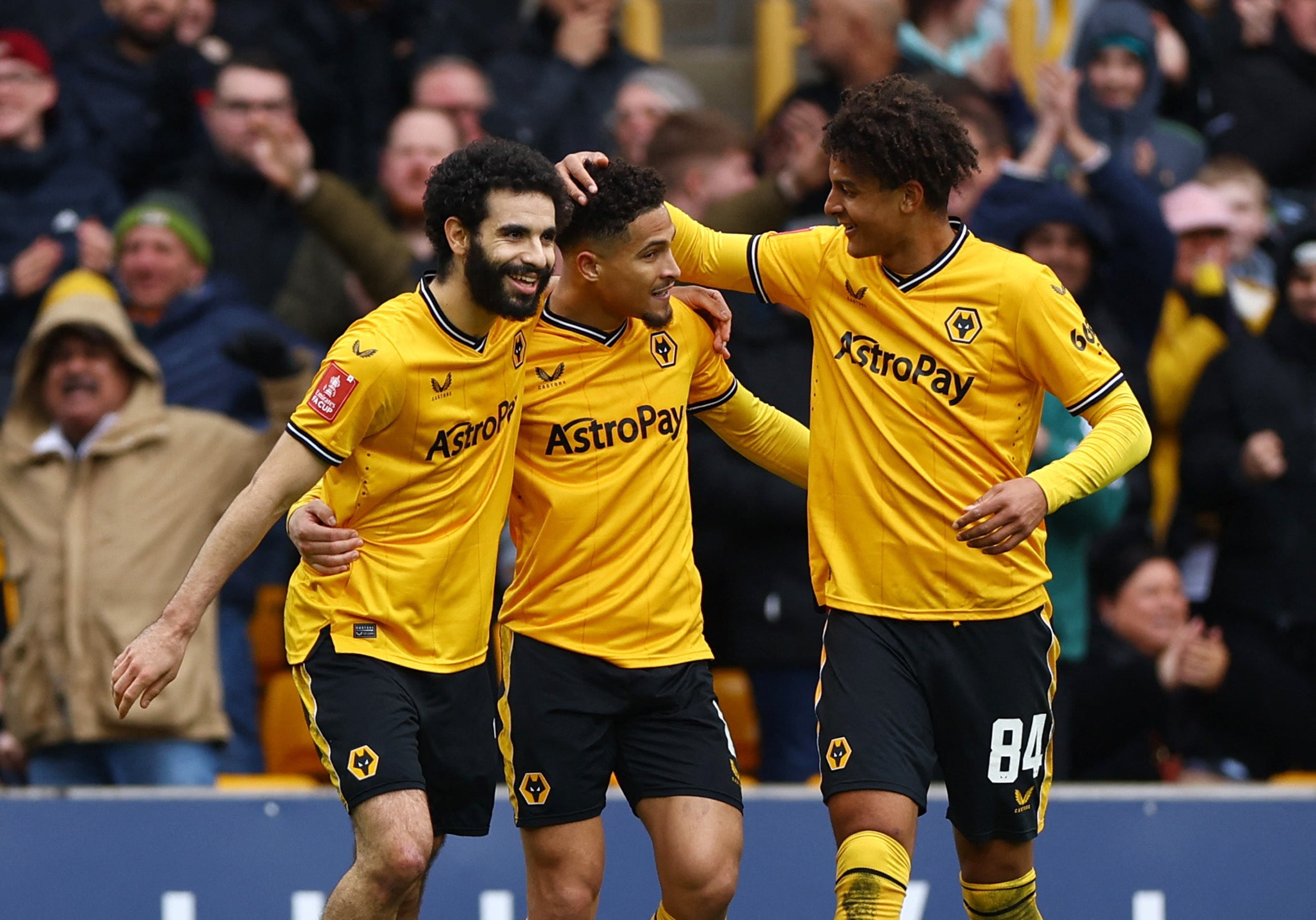 Rayan Ait-Nouri (centre) takes the plaudits after his late equaliser for Wolves