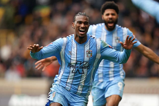 <p>Coventry’s Haji Wright celebrates scoring the added-time winner at Molineux </p>