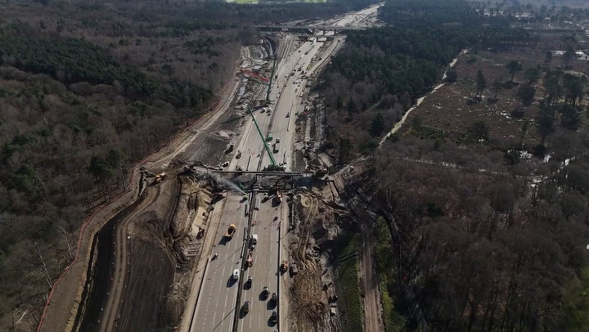 Watch: M25 drone footage shows workers demolishing bridge as motorway remains closed