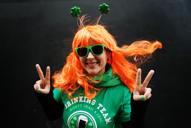 <p>A reveller at a St Patrick’s Day parade in 2023 (PA)</p>