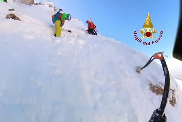 <p>Watch moment three explorers rescued from icy Italian mountain.</p>