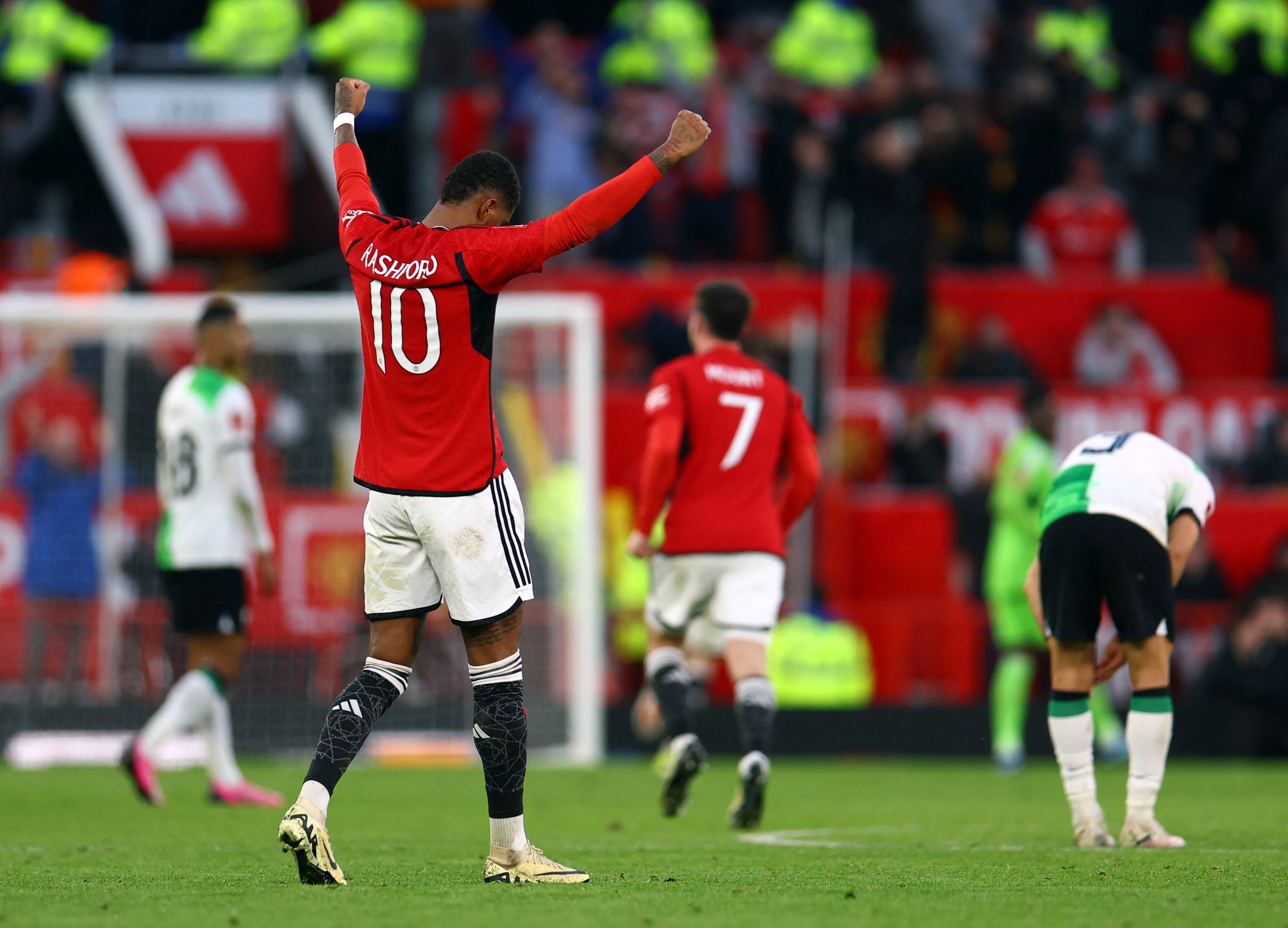 Rashford celebrates after United knocked Liverpool out of the FA Cup