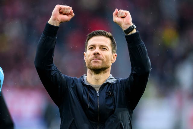 <p>Xabi Alonso’s Bayer Leverkusen beat Freiburg to re-establish their 10-point lead at the top of the Bundesliga (Tom Weller/AP)</p>