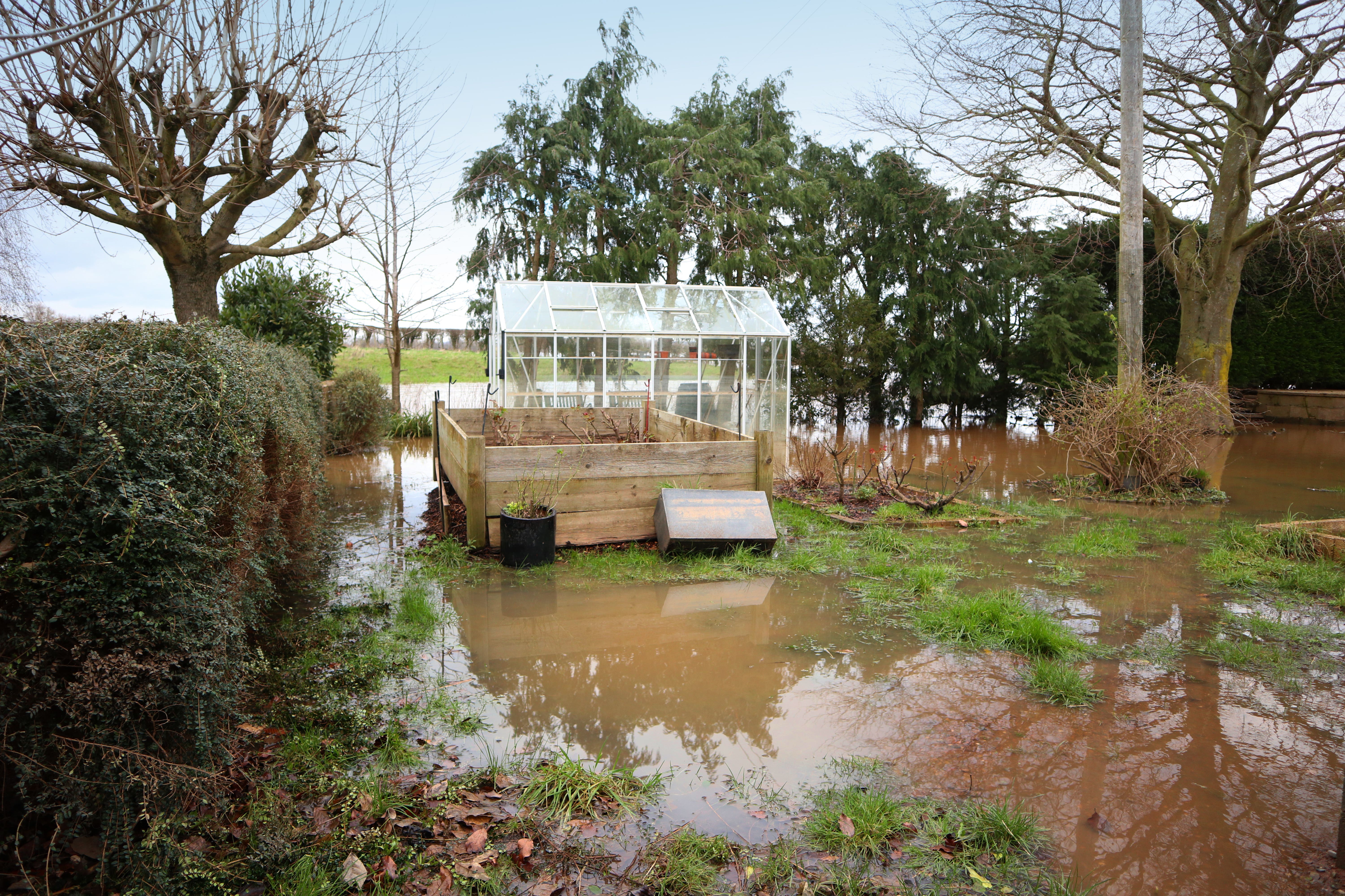 From investing in water butts to improving your soil, essential tips to avoid your garden flooding (Flood Re/PA)