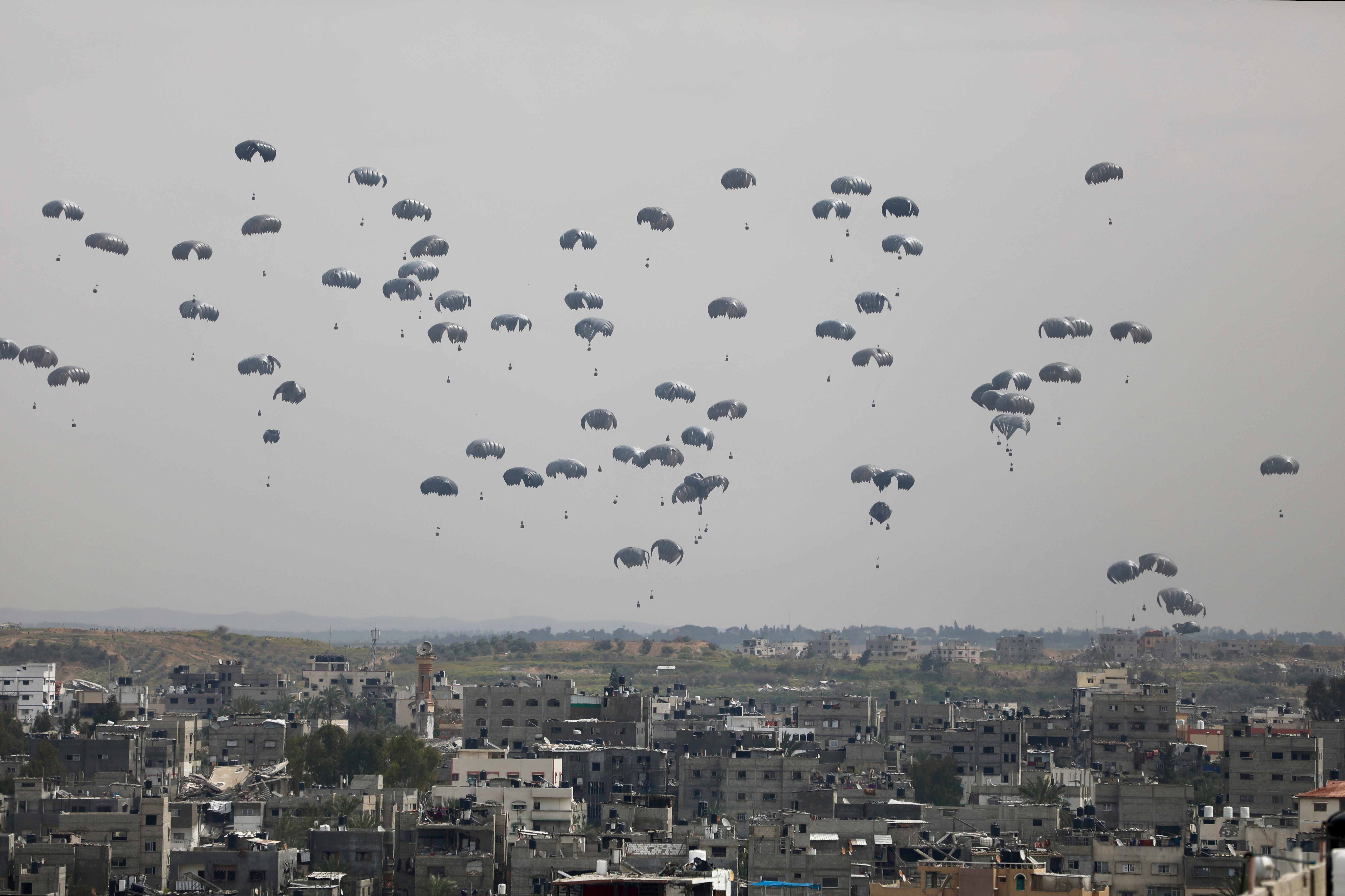 Humanitarian aid is airdropped to Palestinians in Gaza City, northern Gaza