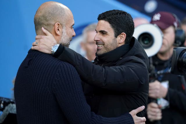 Mikel Arteta’s side lead the way but Manchester City and Liverpool are hot on their heels (Martin Rickett/PA)