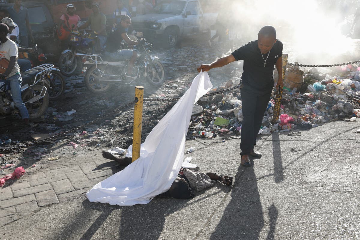 Gangs unleash new attacks on upscale areas in Haiti's capital, with at least a dozen killed nearby