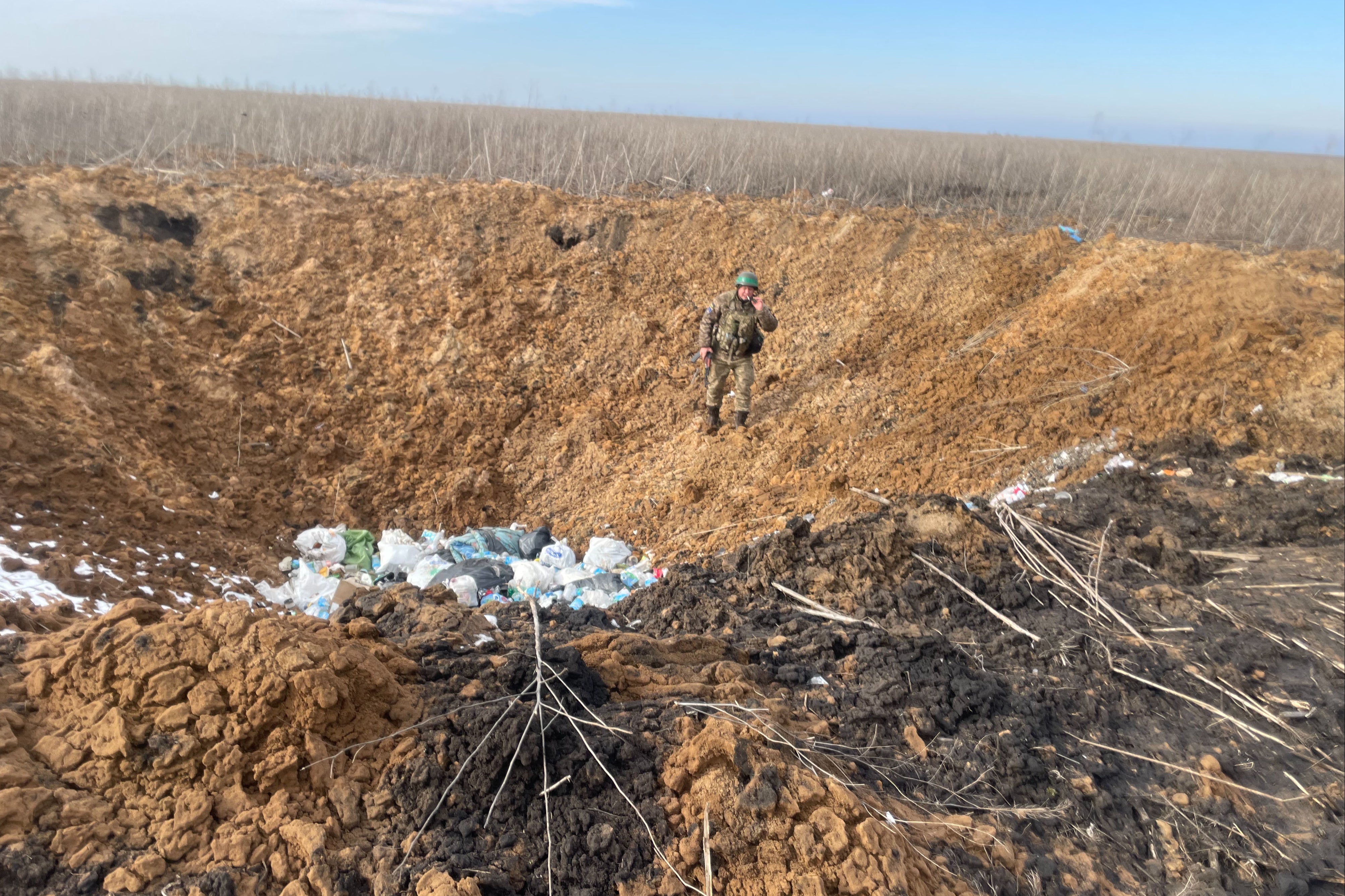 Kandahar in the crater created by a Russian glide bomb near his bunker on the Kupiansk front line