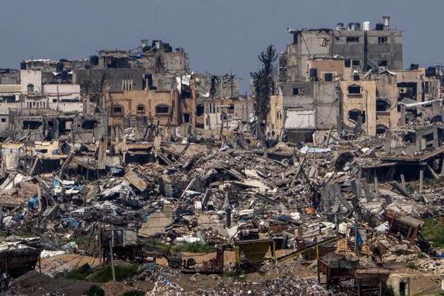 <p>Destroyed buildings stand inside Gaza Strip, as seen from southern Israel, Tuesday, 19 March, 2024</p>