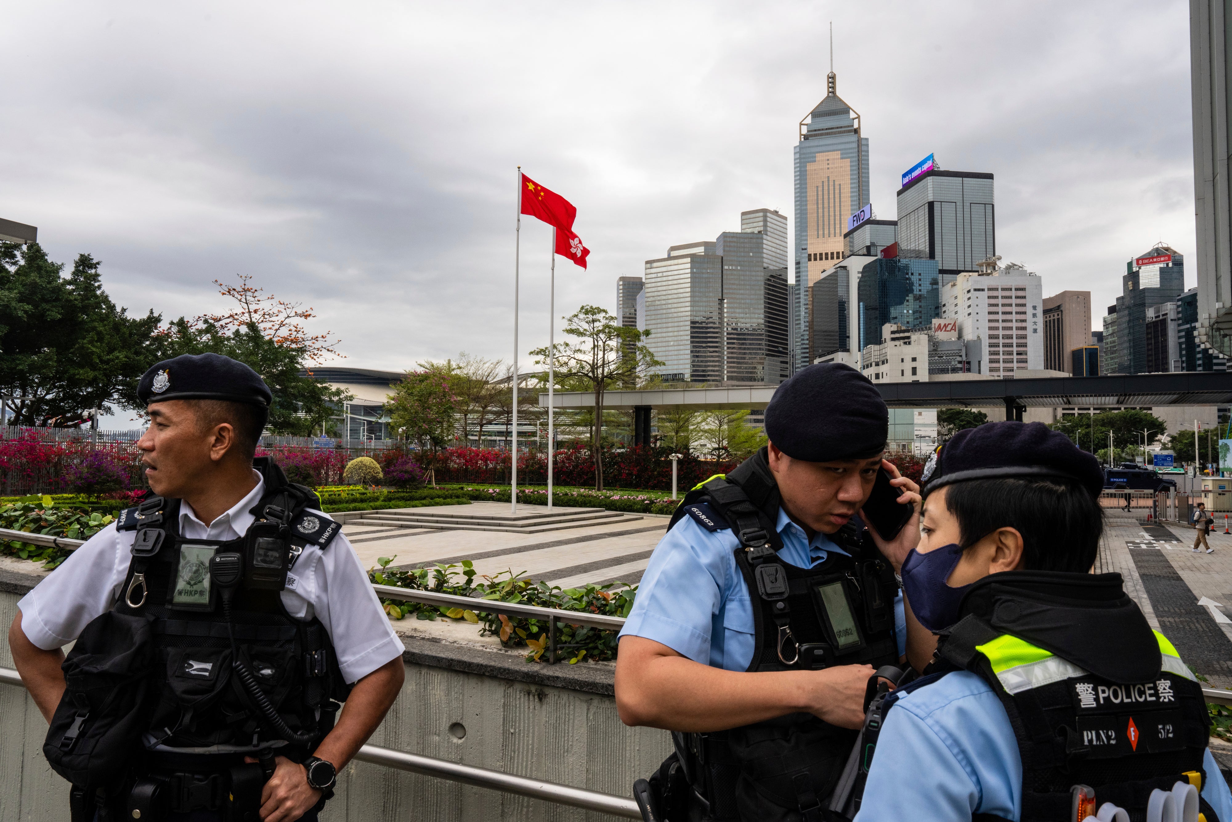 Police officers stand guard outside the Legislative Council