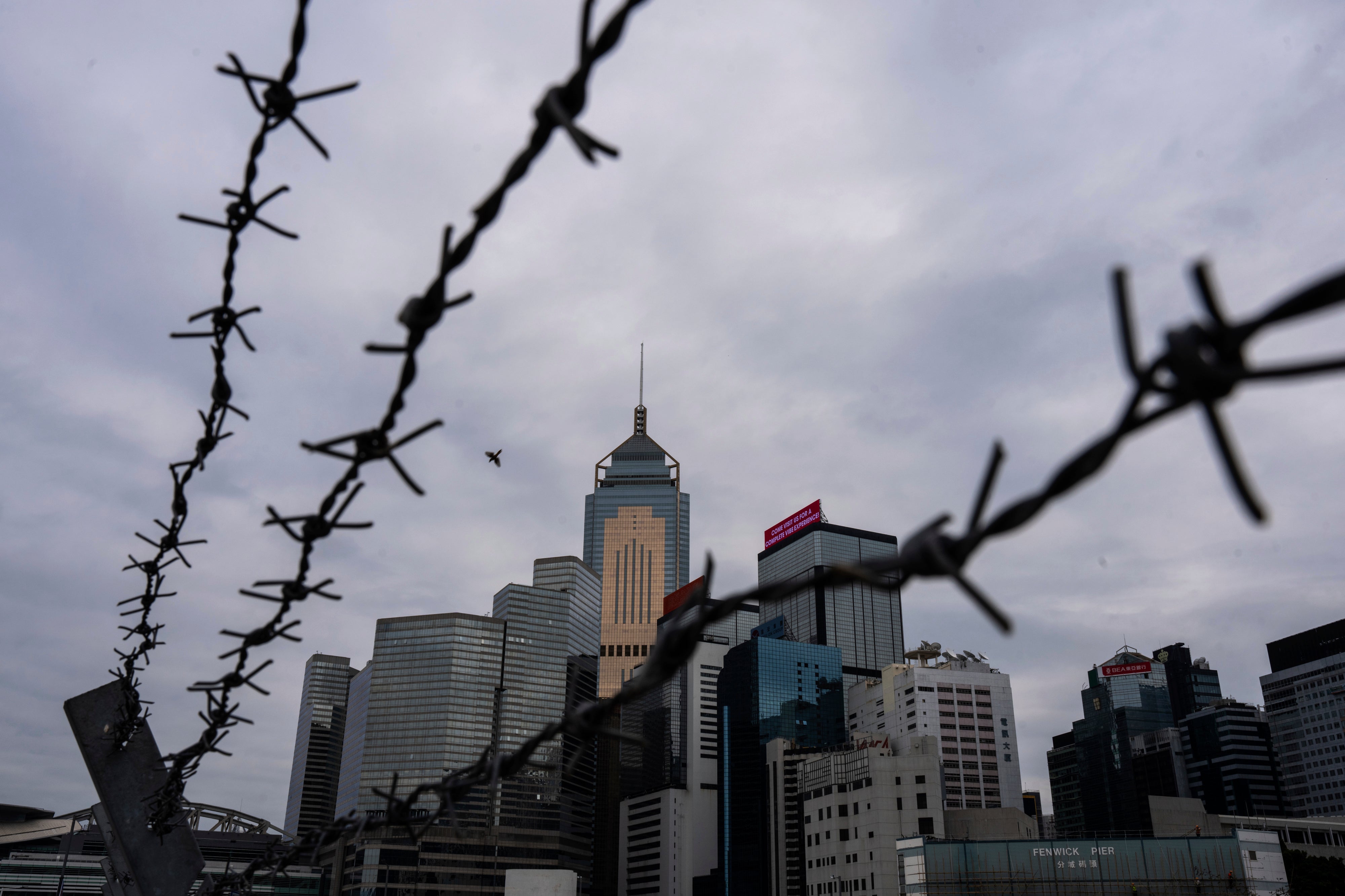The law builds on another imposed on Hong Kong by Beijing four years ago