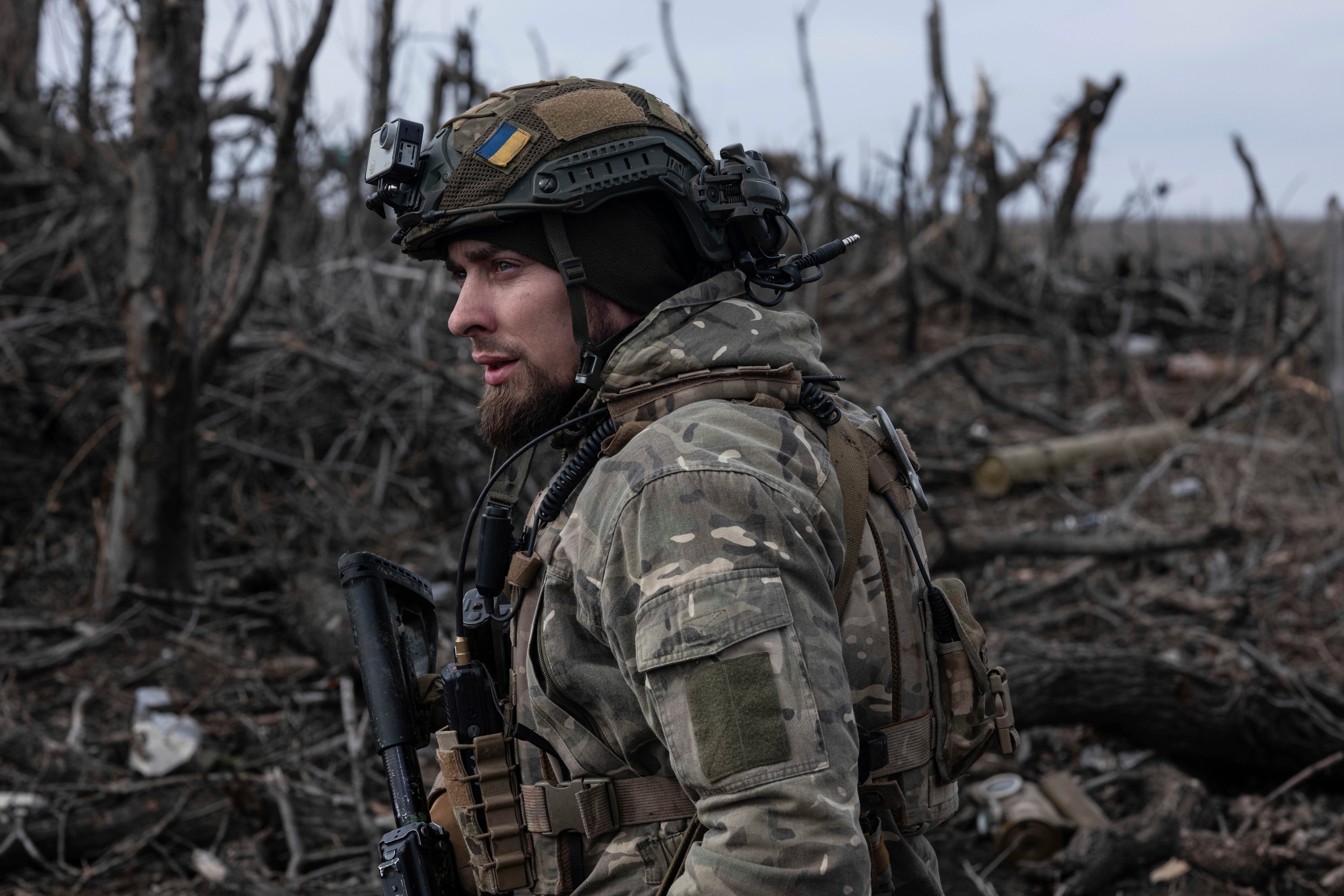 A Ukrainian soldier stands in position on the front-line near Klishchiivka, Donetsk region, Ukraine