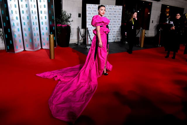 Florence Pugh wore a vibrant Dries Van Noten gown to the 2020 Baftas (Matt Crossick/PA)
