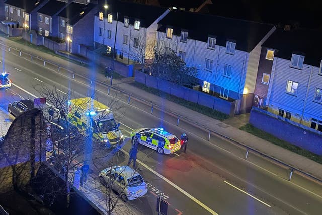 <p>Emergency services at the scene on Battersea Park Road following the attack </p>