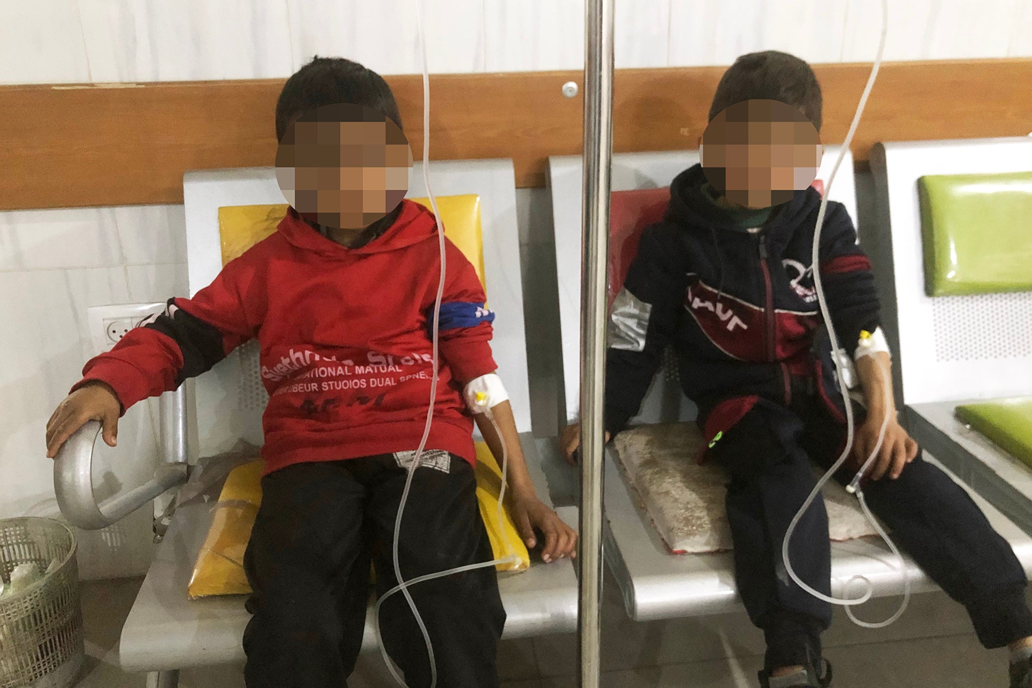 Children on IV drips inside the Kamal Adwan hospital in Gaza City