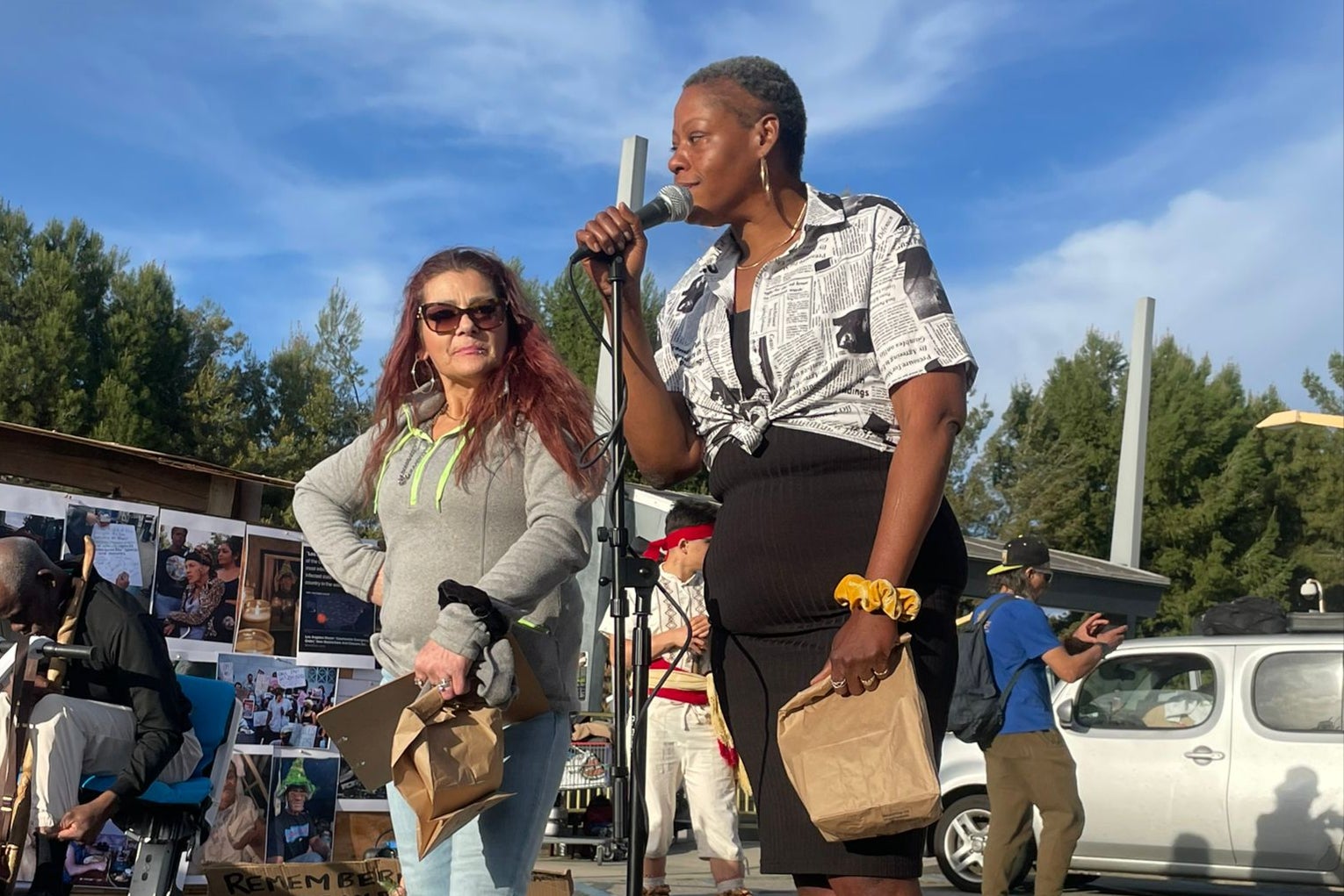 Van Nuys homeless community members Kookie (left) and Jelly (right) speak at a memorial event for their frriends