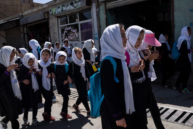 <p>Young students walk from school in Kabul, Afghanistan on 7 June 2023</p>