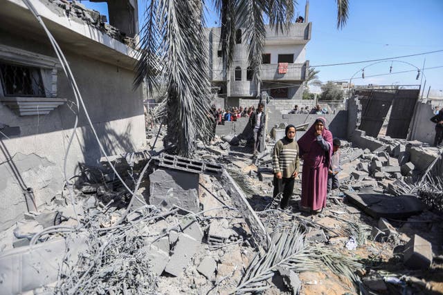 <p>People inspect damage and recover items from their homes following Israeli air strikes on March 20, 2024 in Rafah, Gaza</p>
