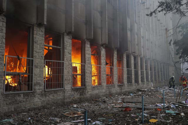 <p>Firefighters at a printing house hit by a Russian missile in Kharkiv</p>
