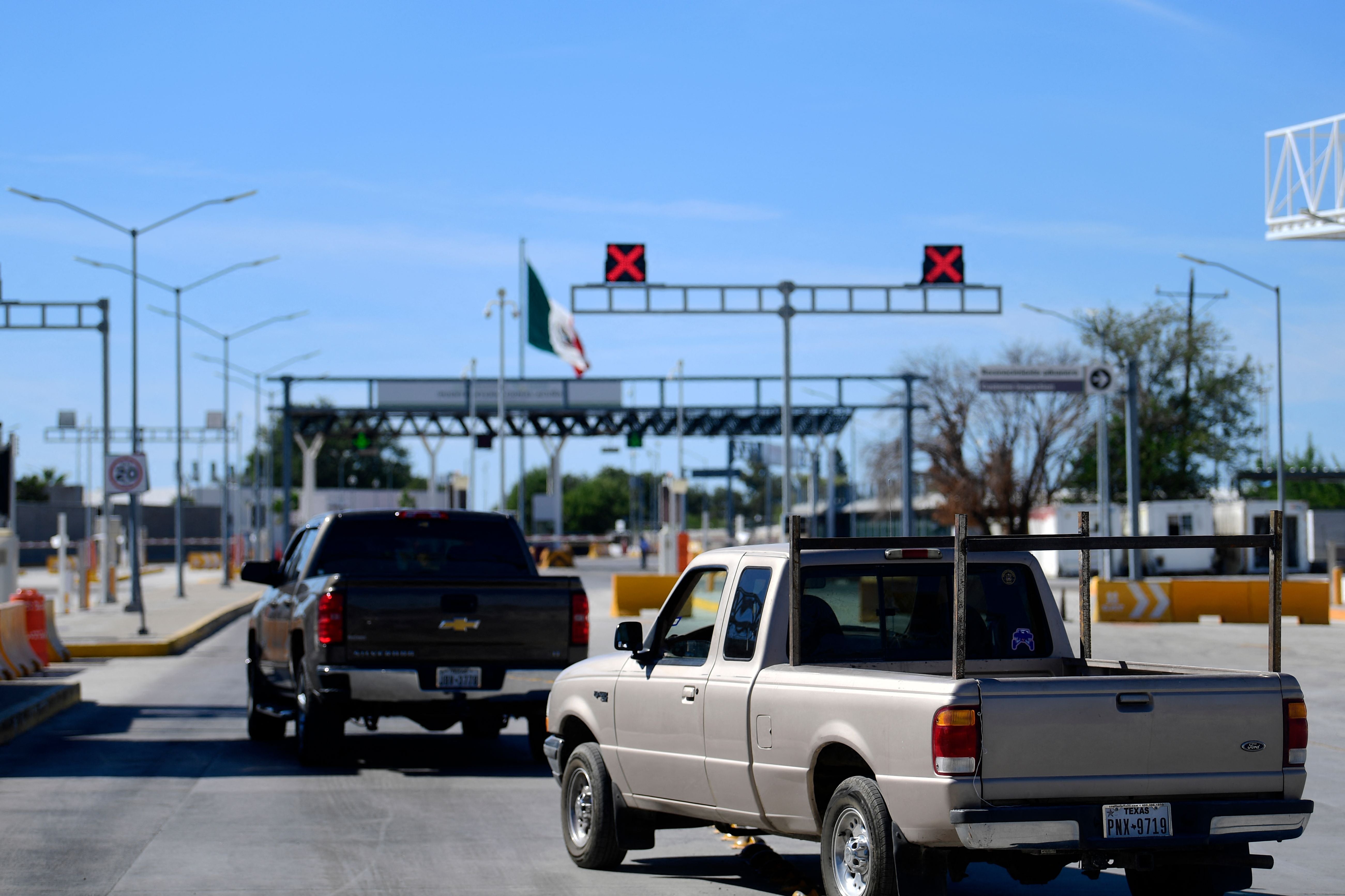 Cars wait in line to cross the border during the reopening of the Ciudad Acuna, Coahuila - Del Rio, Texas, US, international bridge in September 2021
