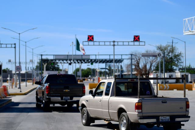 <p>Cars wait in line to cross the border during the reopening of the Ciudad Acuna, Coahuila - Del Rio, Texas, US, international bridge in September 2021 </p>
