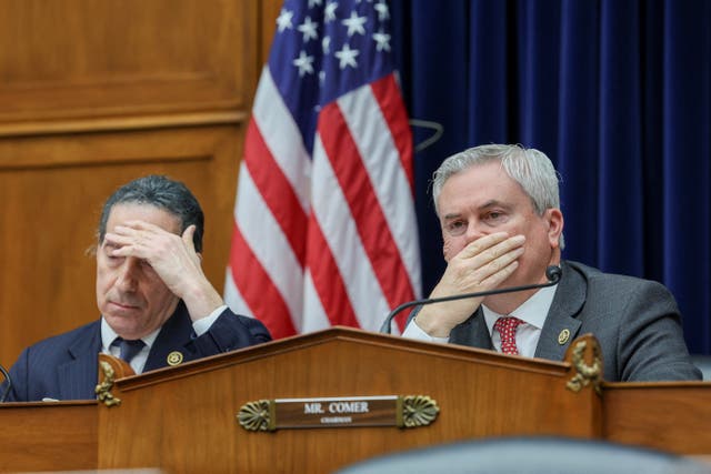 <p>Ranking member Jamie Raskin (D-MD) and House Oversight Committee Chairman James Comer (R-KY) cover their faces during a House Oversight and Accountability Committee hearing as part of the House of Republicans’ impeachment probe into President Joe Biden</p>