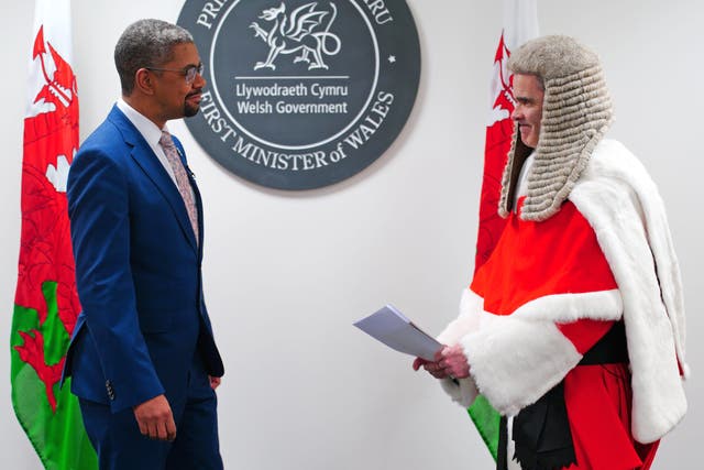 New First Minister of Wales Vaughan Gething with Justice Martin Griffiths, presiding judge of Wales, with his signed affirmation at the Senedd in Cardiff (Ben Birchall/PA)