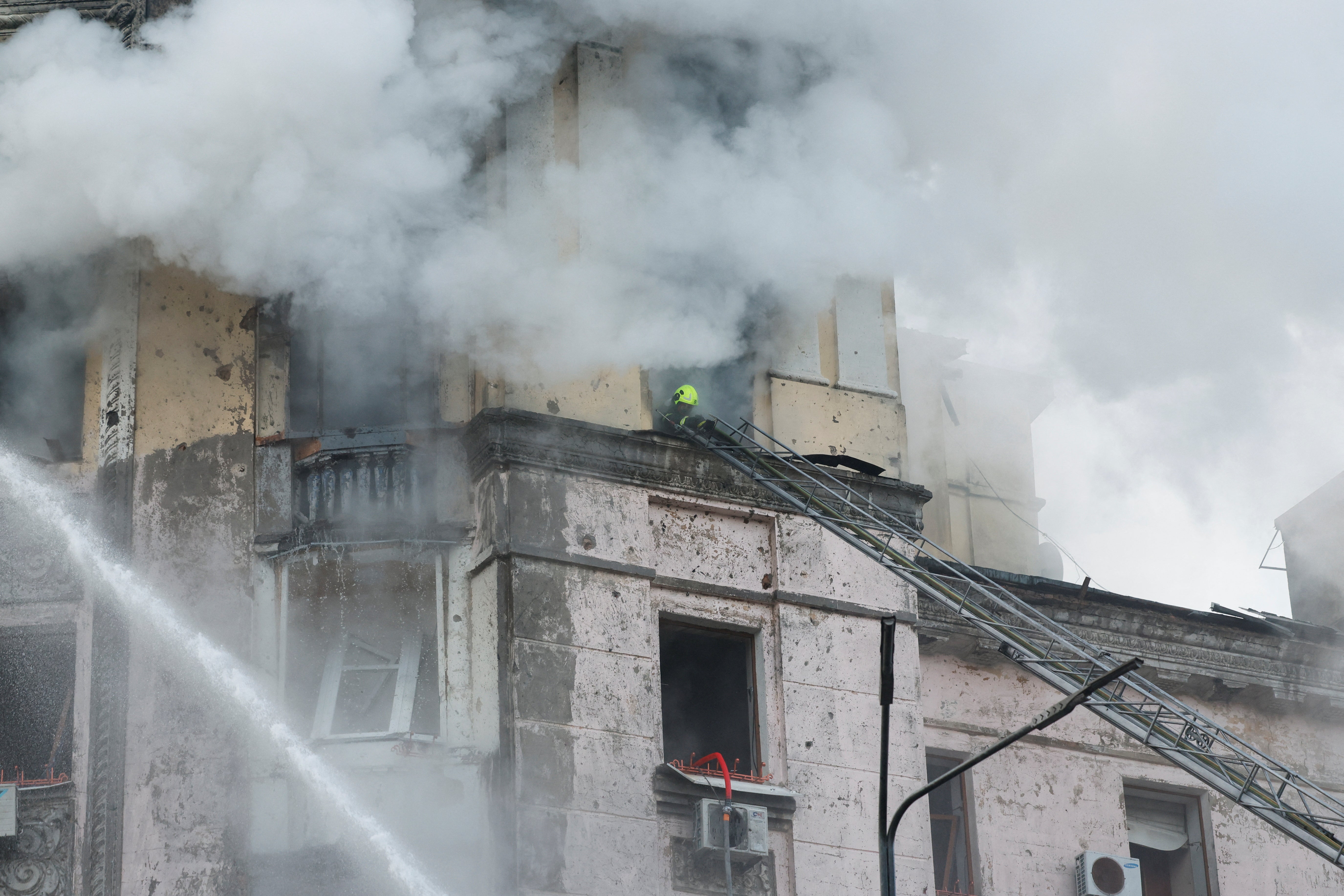 <p>A rescuer works at a site of a building, damaged during a Russian missile strike, amid Russia’s attack on Ukraine, in Kyiv, Ukraine 21 March 2024</p>