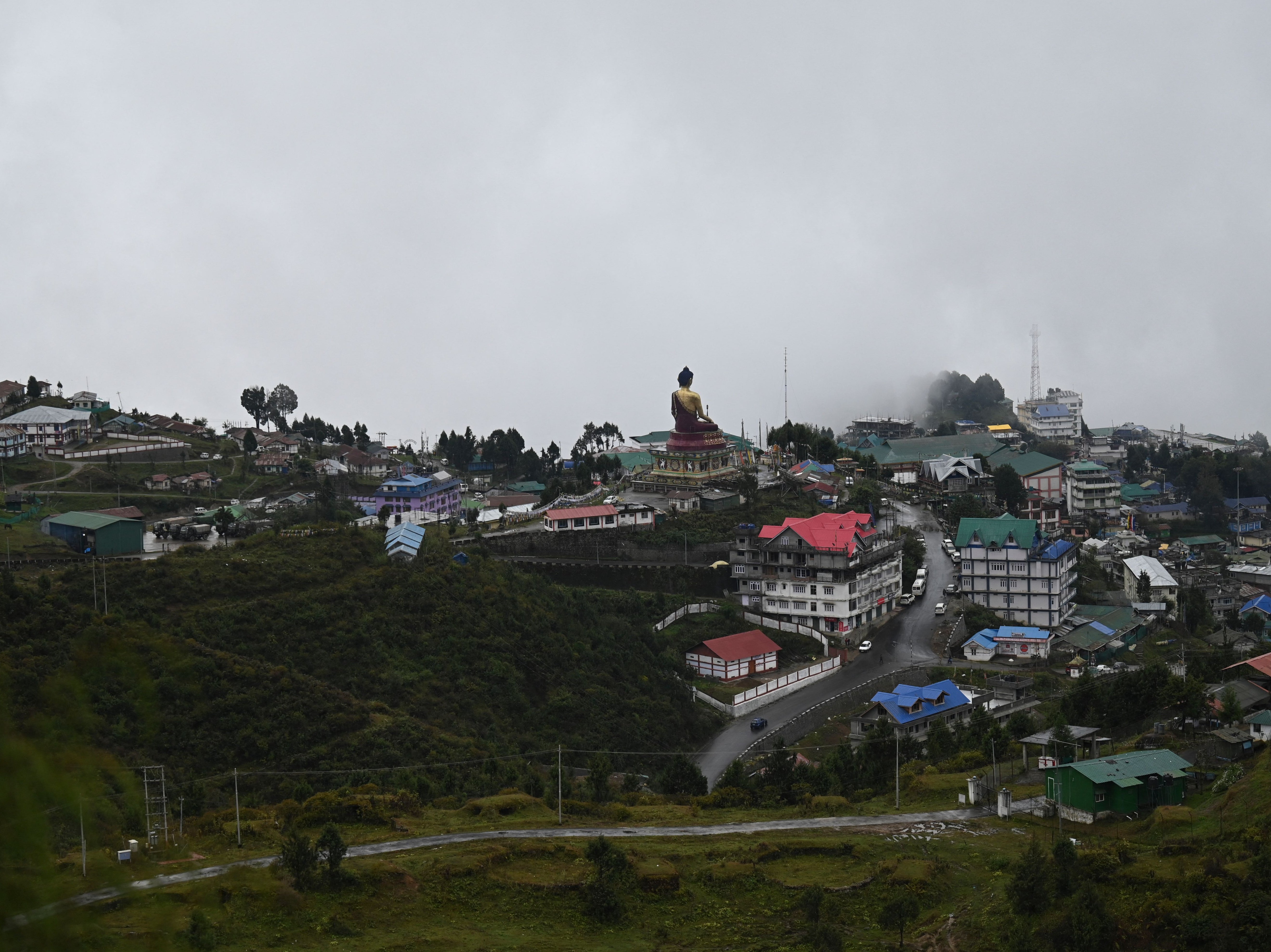 A statue of Buddha is seen in Tawang near the Line of Actual Control (LAC), neighbouring China, in the northeast Indian state of Arunachal Pradesh on October 20, 2021