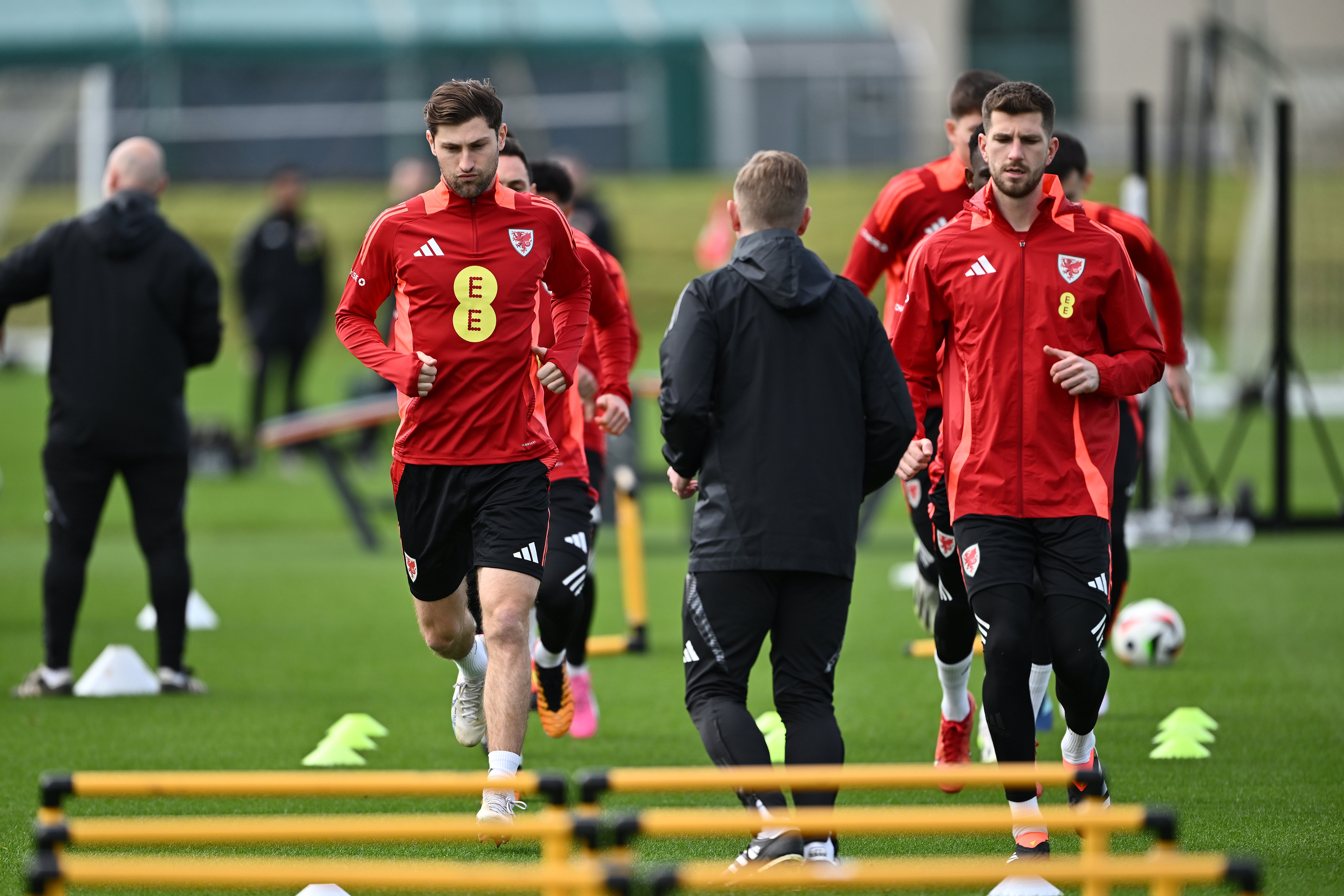 Ben Davies, left, trains at The Vale Resort in Glamorgan on Monday