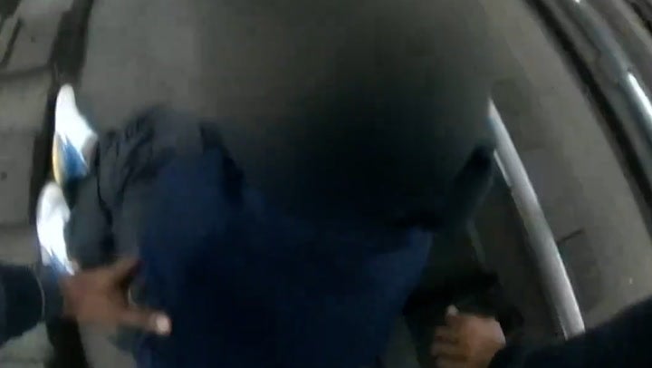 <p>Watch: NYPD officers jump onto subway tracks to rescue man as train approaches.</p>